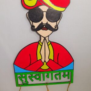 This is a Rajasthani Welcome Wall Hanging Art—a vibrant and traditional piece of decor