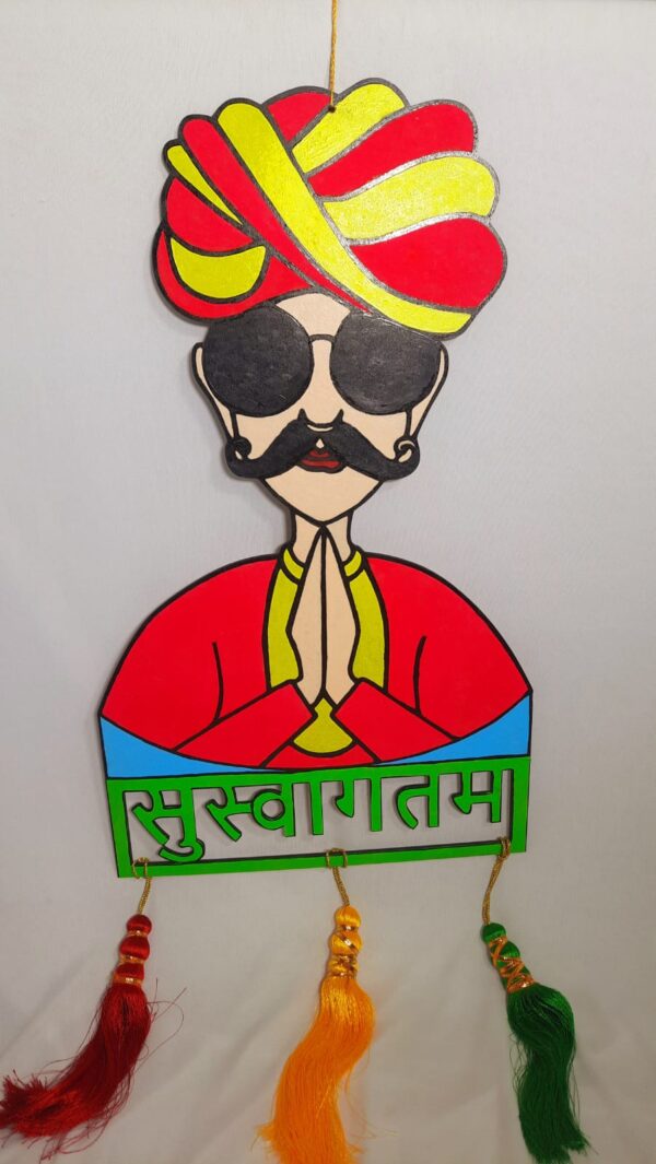 This is a Rajasthani Welcome Wall Hanging Art—a vibrant and traditional piece of decor