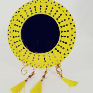 This is a decorative mirror — specifically, it looks like a handcrafted wall hanging mirror
