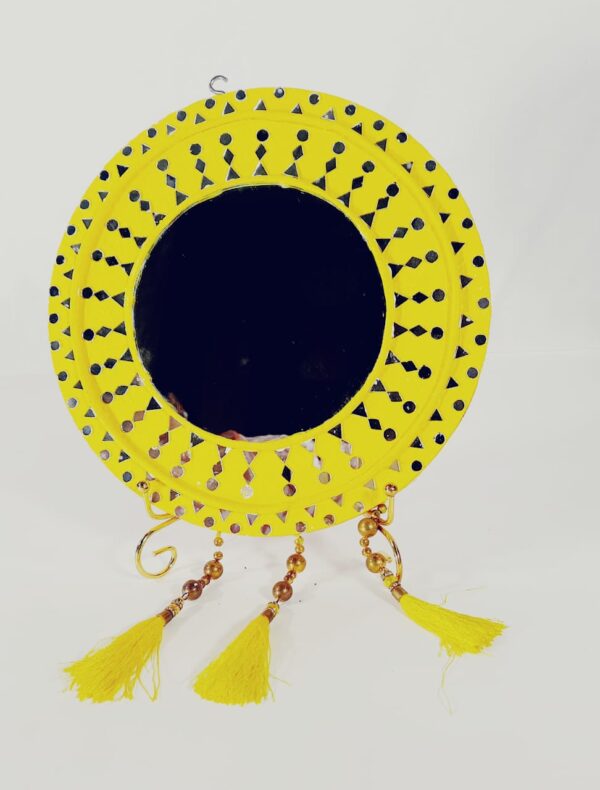 This is a decorative mirror — specifically, it looks like a handcrafted wall hanging mirror