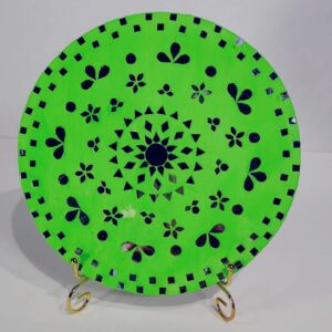 This is a Handcrafted Decorative Wall Plate featuring mirror work with a mandala-inspired floral design on a bright green base.