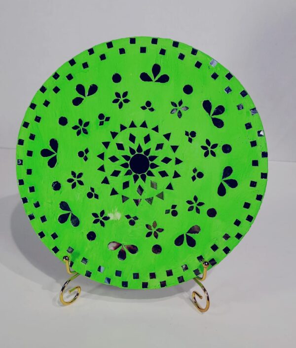 This is a Handcrafted Decorative Wall Plate featuring mirror work with a mandala-inspired floral design on a bright green base.